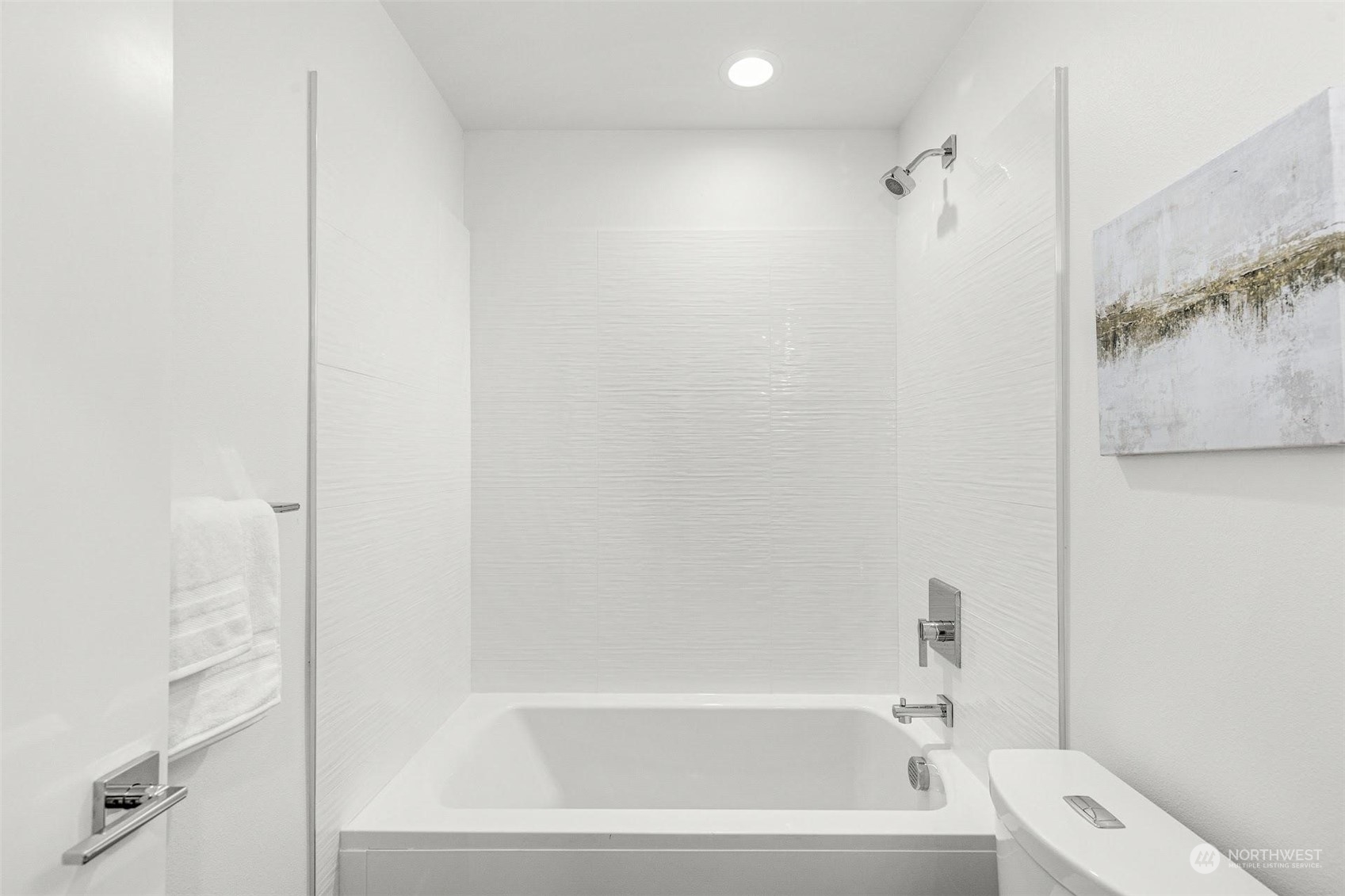 10146 Holman Road Northwest Seattle, WA 98133 - Photo 14 of 24 a bathroom with a bathtub and a shower