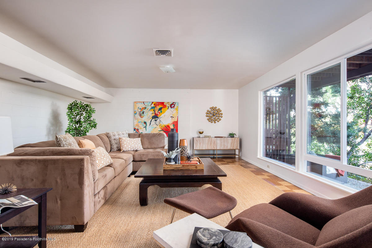 300 Anita Drive Pasadena, CA 91105 - Photo 23 of 28 a living room with furniture and a large window