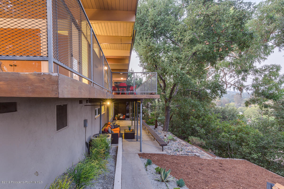 300 Anita Drive Pasadena, CA 91105 - Photo 27 of 28 a front view of a house with a yard and sitting area