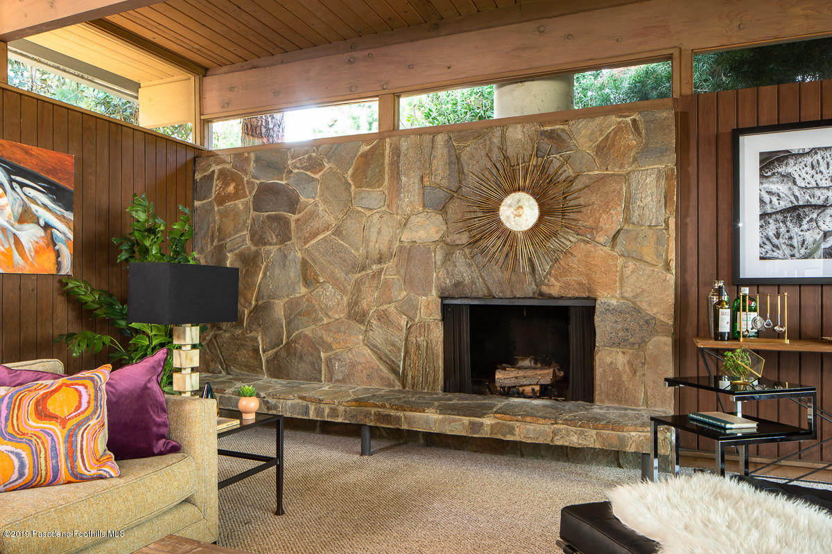 300 Anita Drive Pasadena, CA 91105 - Photo 6 of 28 a living room with furniture and a fireplace