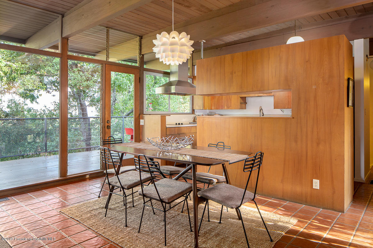 300 Anita Drive Pasadena, CA 91105 - Photo 9 of 28 a view of a dining room with furniture wooden floor and chandelier