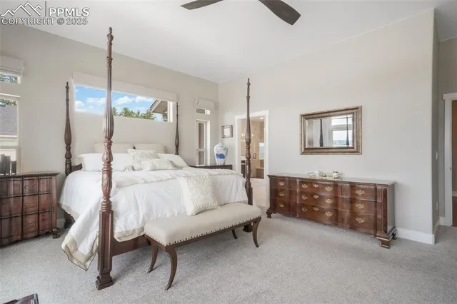 a bedroom with furniture a bed and a window