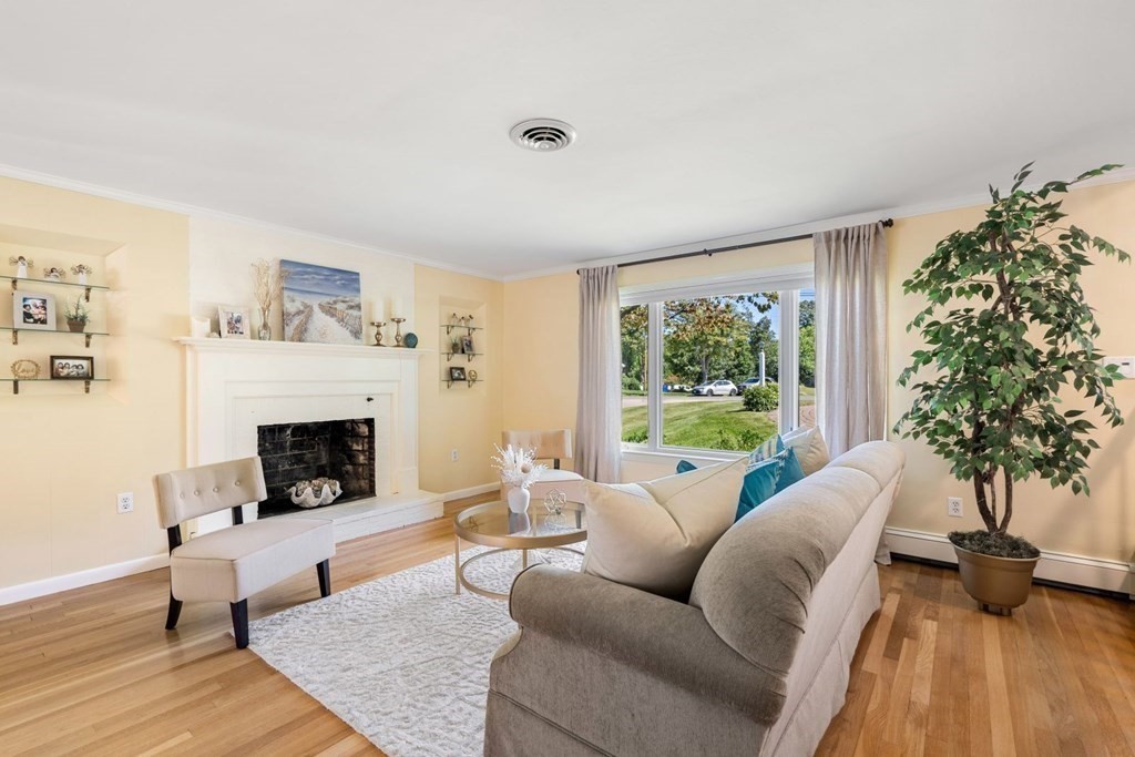14 Highview Drive Hingham, MA 02043 - Photo 11 of 41 a living room with furniture large window and a fireplace