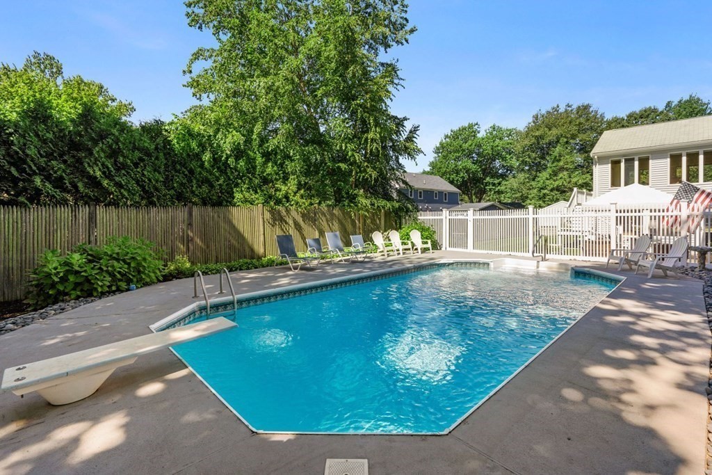 14 Highview Drive Hingham, MA 02043 - Photo 32 of 41 a view of a swimming pool with a patio