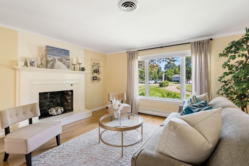 14 Highview Drive Hingham, MA 02043 - Photo 9 of 41 a living room with furniture and a fireplace