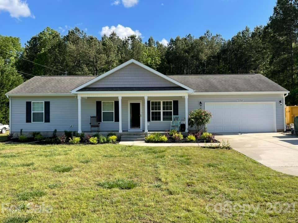 5150 Taxahaw Road Lancaster, SC 29720 - Photo 1 of 27 a front view of a house with a yard