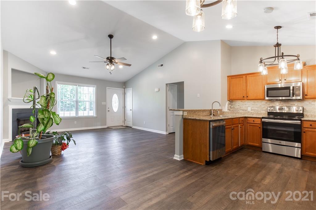 5150 Taxahaw Road Lancaster, SC 29720 - Photo 11 of 27 a kitchen with sink refrigerator and window