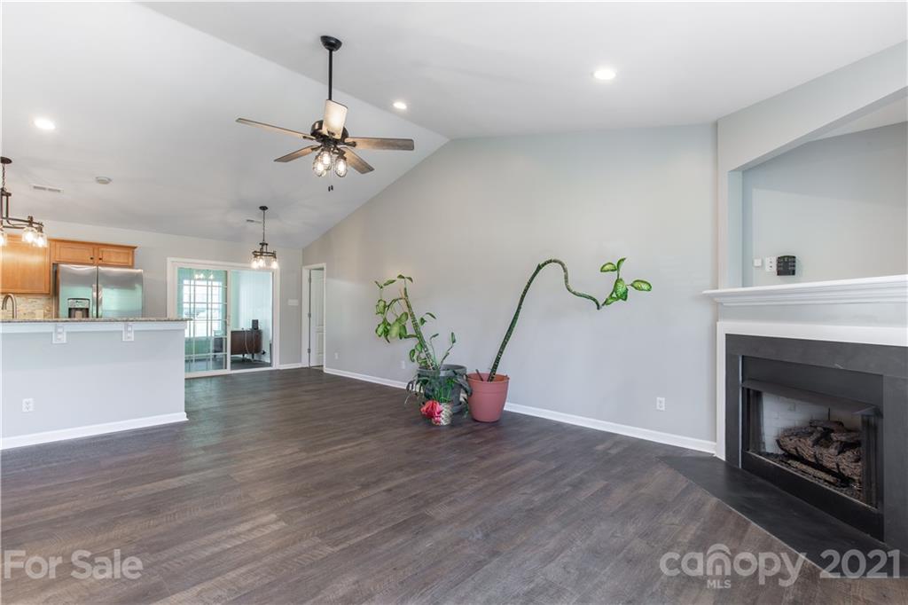 5150 Taxahaw Road Lancaster, SC 29720 - Photo 13 of 27 a living room with furniture and a fireplace