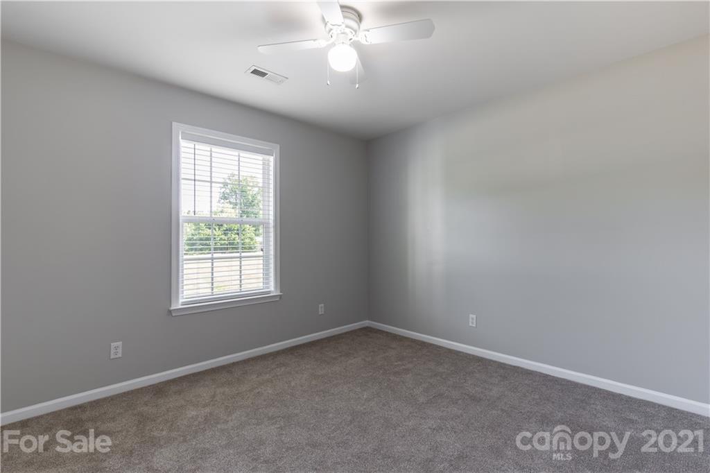 5150 Taxahaw Road Lancaster, SC 29720 - Photo 18 of 27 an empty room with a window