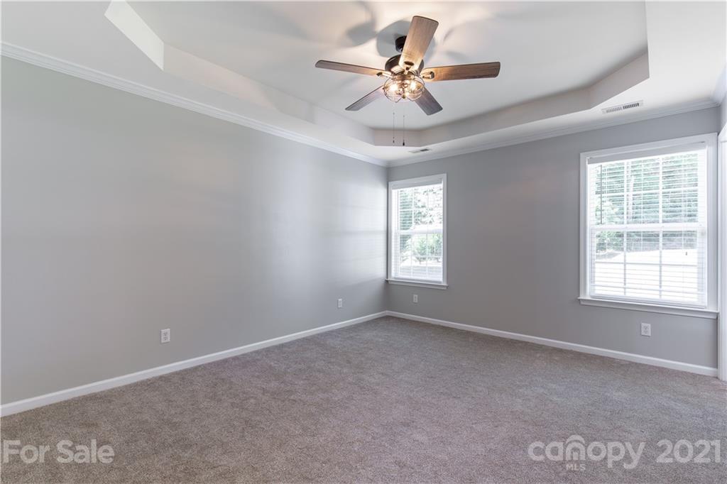 5150 Taxahaw Road Lancaster, SC 29720 - Photo 20 of 27 a view of room with a ceiling fan and window