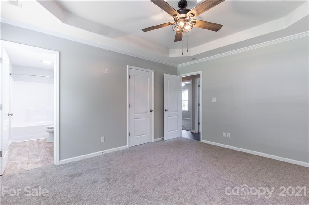 5150 Taxahaw Road Lancaster, SC 29720 - Photo 21 of 27 a view of an empty room and chandelier fan