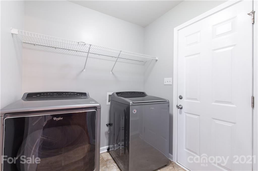 5150 Taxahaw Road Lancaster, SC 29720 - Photo 23 of 27 a utility room with dryer and washer