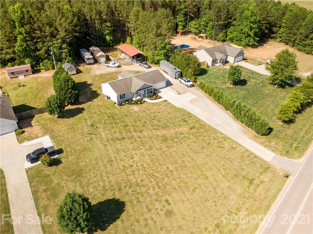 5150 Taxahaw Road Lancaster, SC 29720 - Photo 24 of 27 a view of swimming pool with a yard