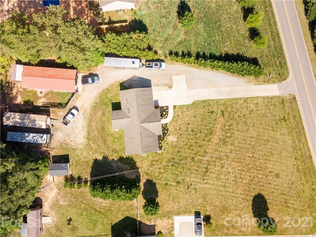 5150 Taxahaw Road Lancaster, SC 29720 - Photo 25 of 27 view of building with yard
