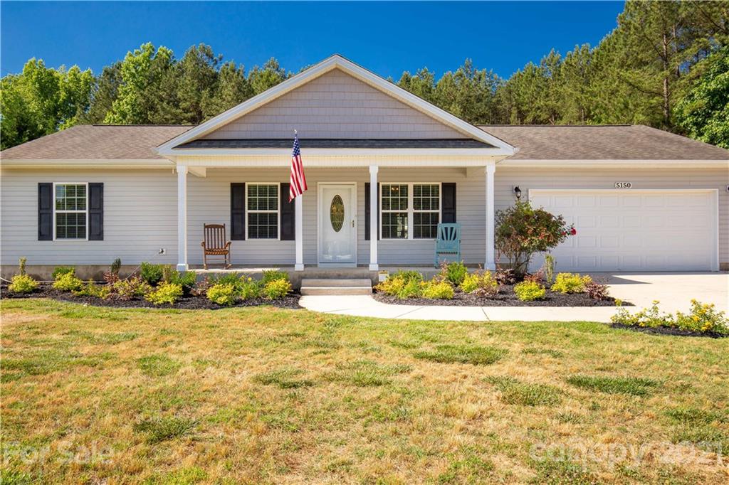 5150 Taxahaw Road Lancaster, SC 29720 - Photo 8 of 27 a view of a house with swimming pool and sitting area