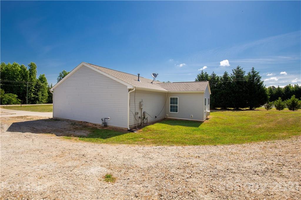 5150 Taxahaw Road Lancaster, SC 29720 - Photo 10 of 27 a view of backyard of house and outdoor seating