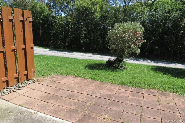 a view of backyard with green space