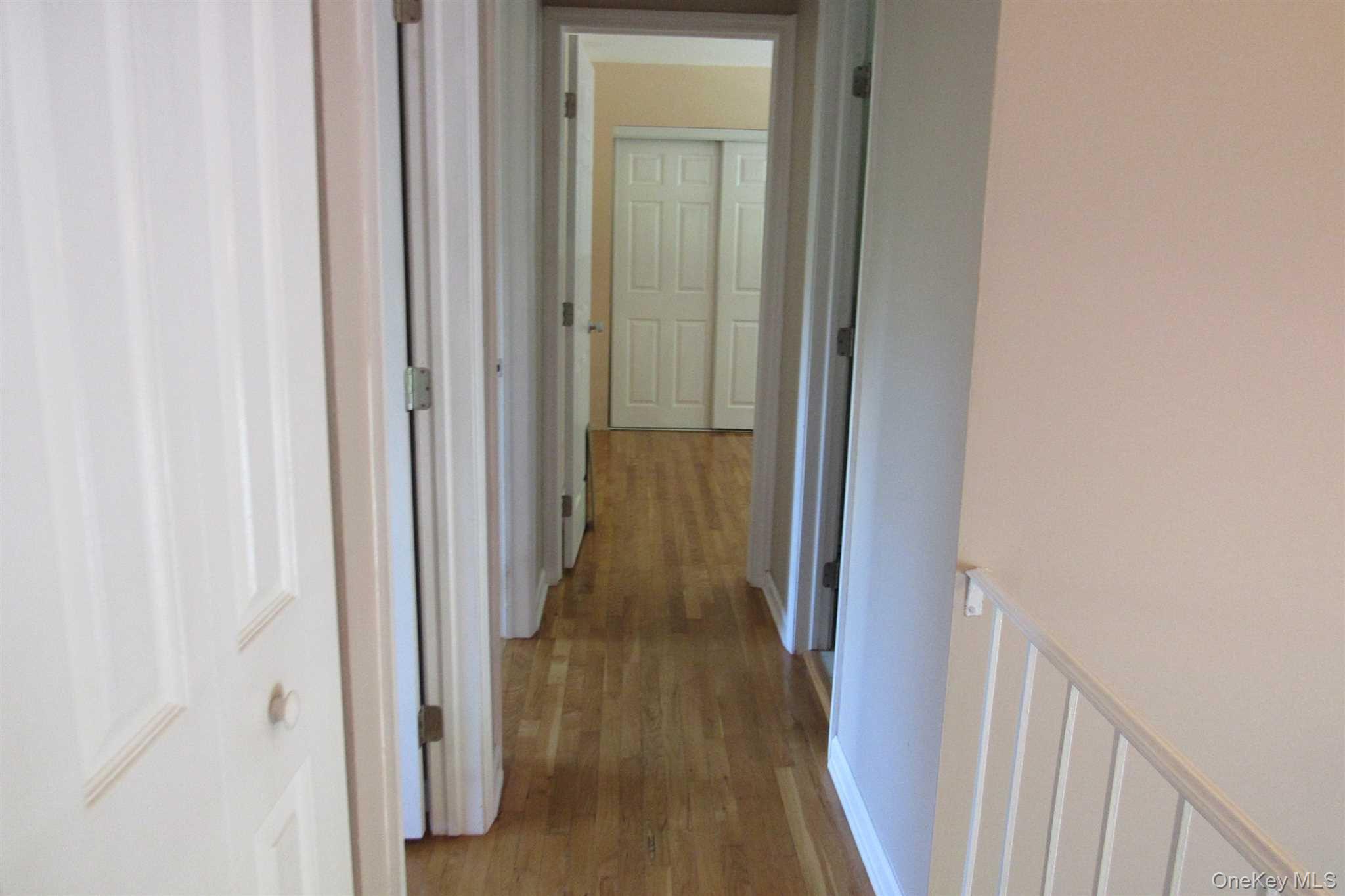34 Alpine Drive, Unit A Wappingers Falls, NY 12590 - Photo 13 of 20 a view of a hallway with wooden floor