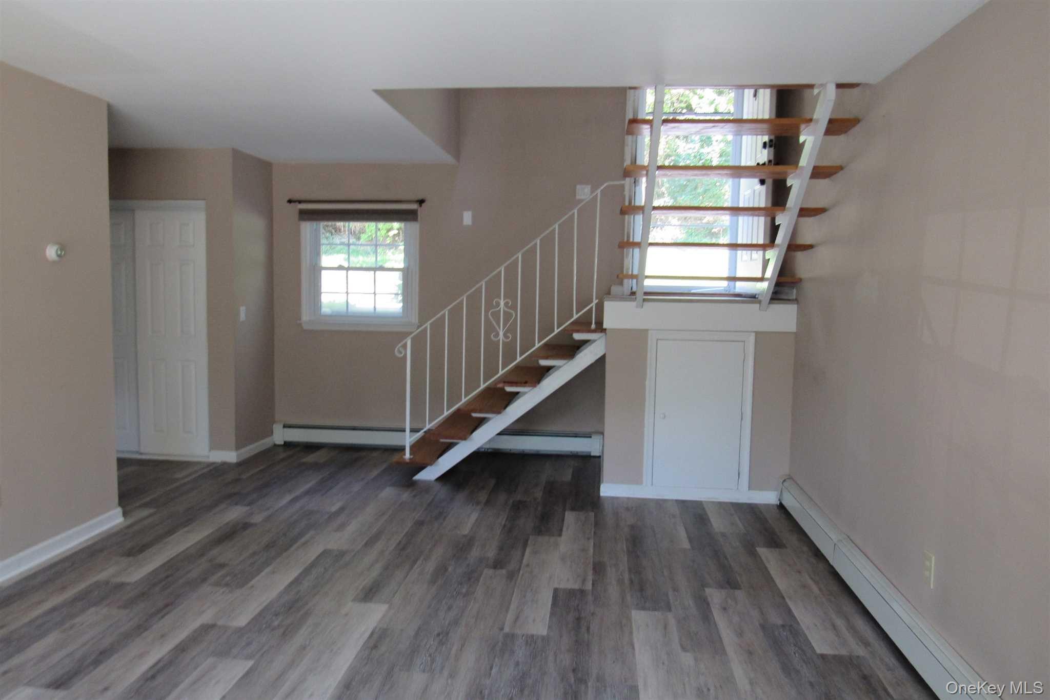 34 Alpine Drive, Unit A Wappingers Falls, NY 12590 - Photo 5 of 20 a view of entryway with wooden floor