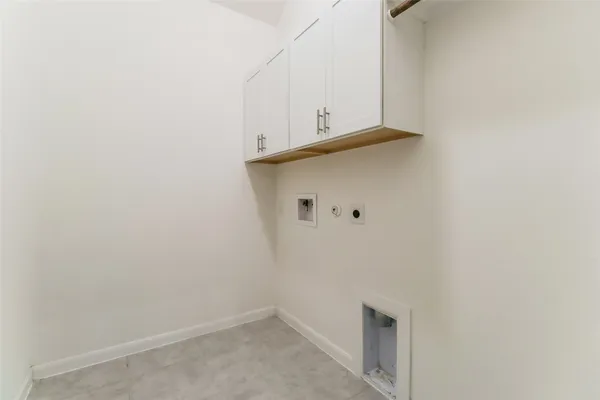 a bathroom with a double vanity sink a mirror and a shower