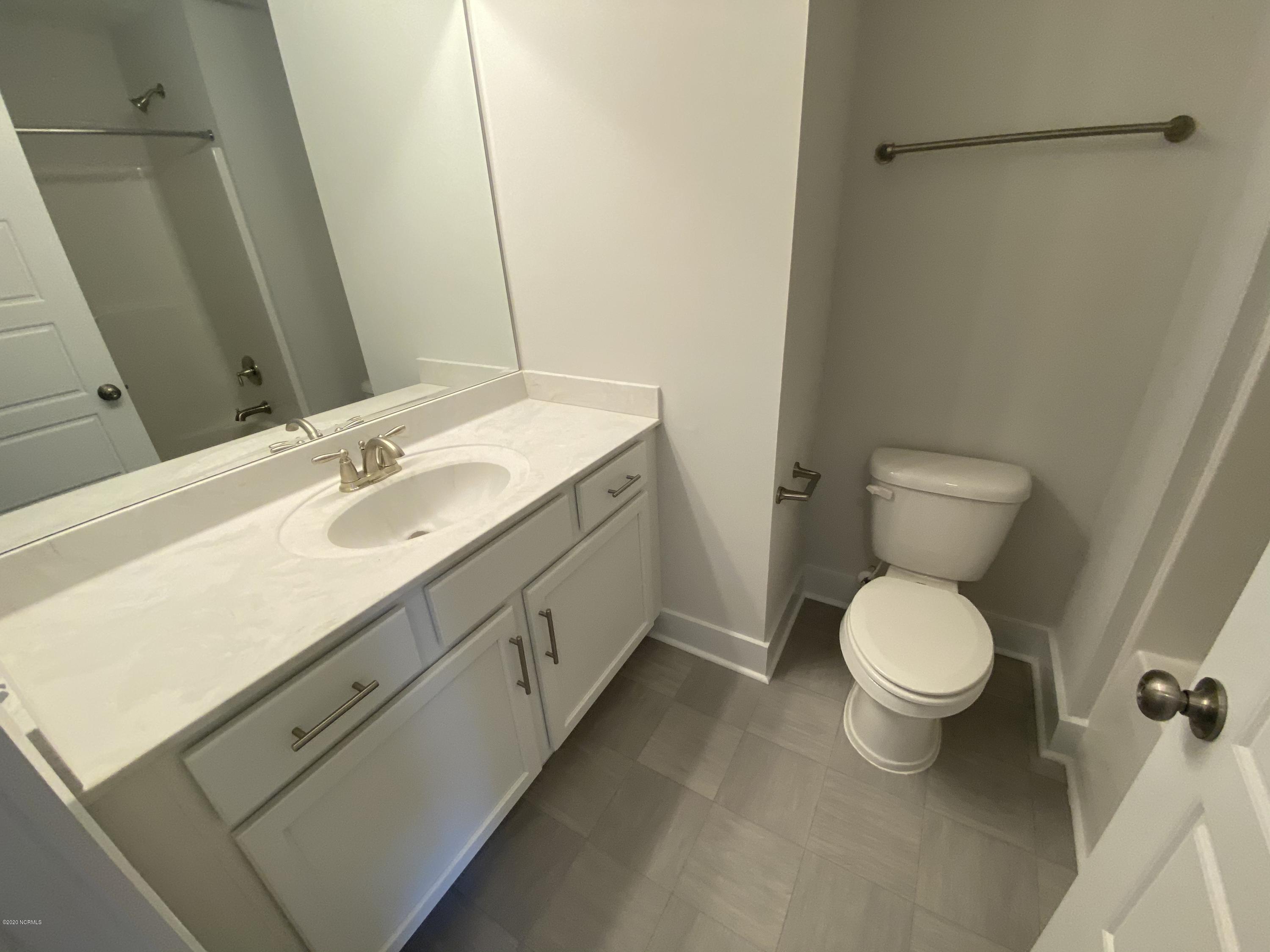 112 Aspen Road Hampstead, NC 28443 - Photo 16 of 24 Upstairs Hall Bathroom
