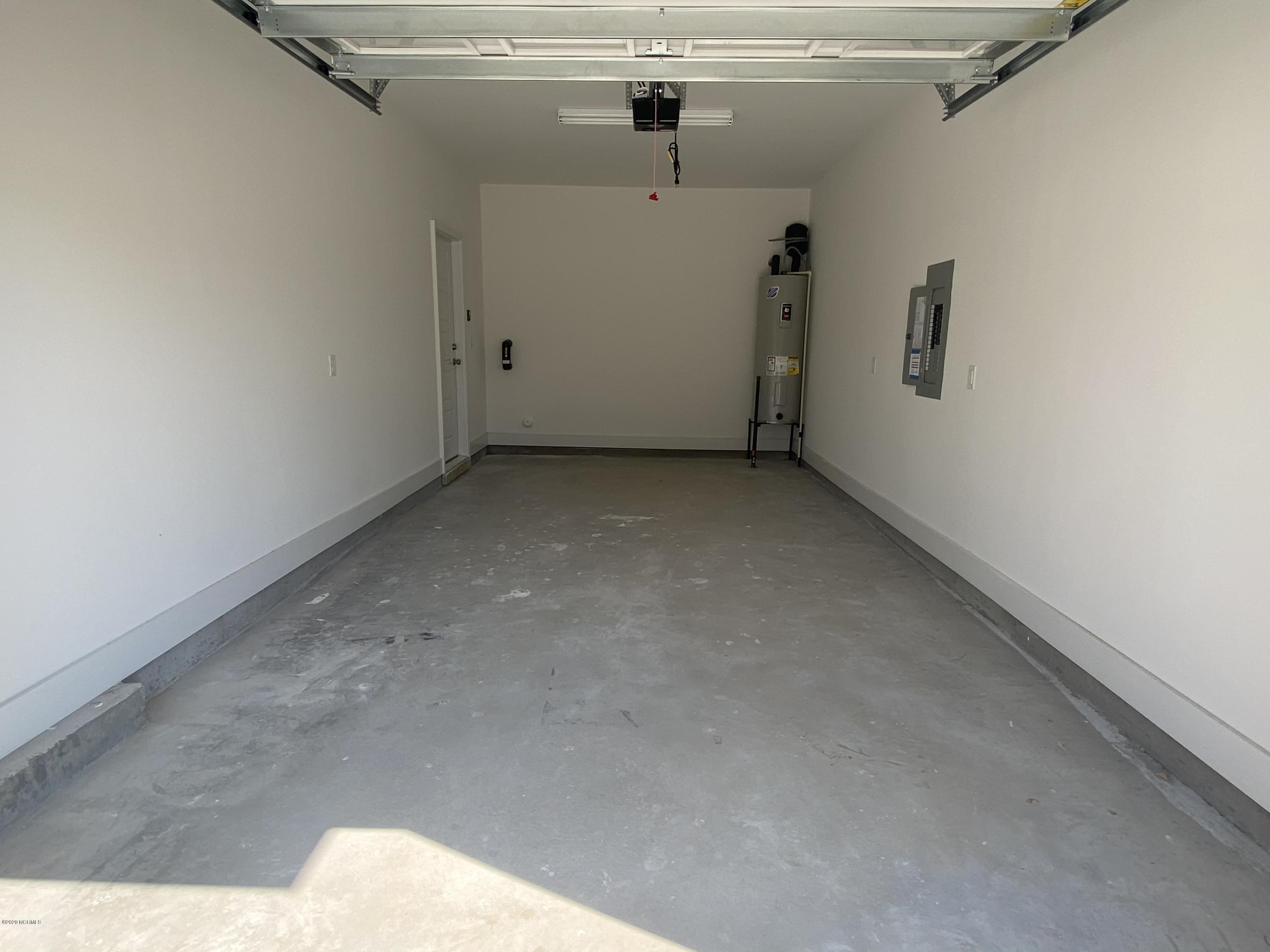 112 Aspen Road Hampstead, NC 28443 - Photo 19 of 24 Garage