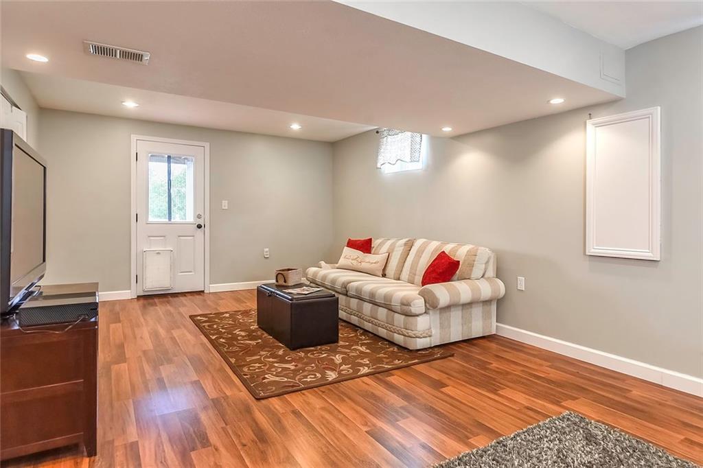 503 Walnut Drive McKees Rocks, PA 15136 - Photo 19 of 25 Recessed lighting, gleaming floors, and walk out to the back yard are just a few of the finished basements features.
