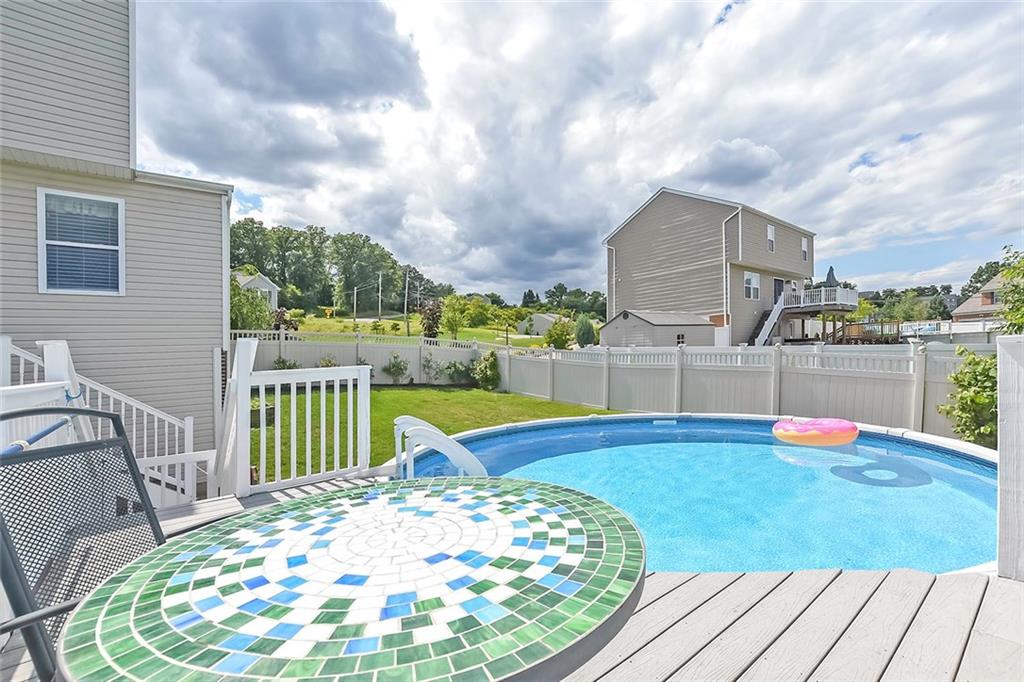 503 Walnut Drive McKees Rocks, PA 15136 - Photo 24 of 25 Soak up the summer sun on the pool deck or floating in the pool.