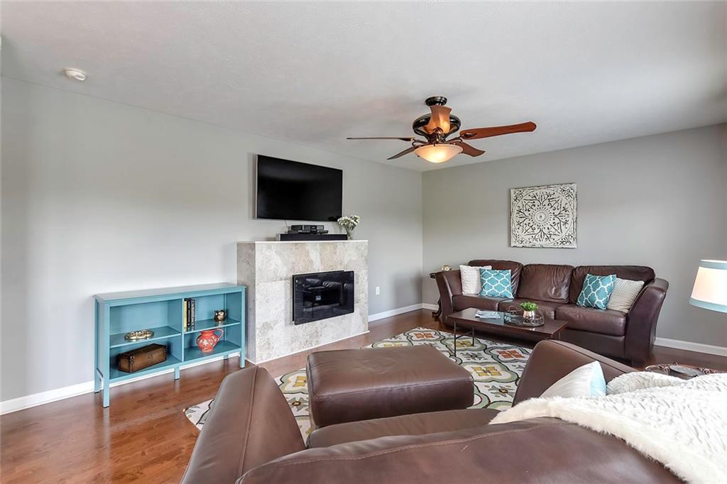 503 Walnut Drive McKees Rocks, PA 15136 - Photo 7 of 25 Cuddle up, read a book, and relax next to the gas fireplace in the family room.
