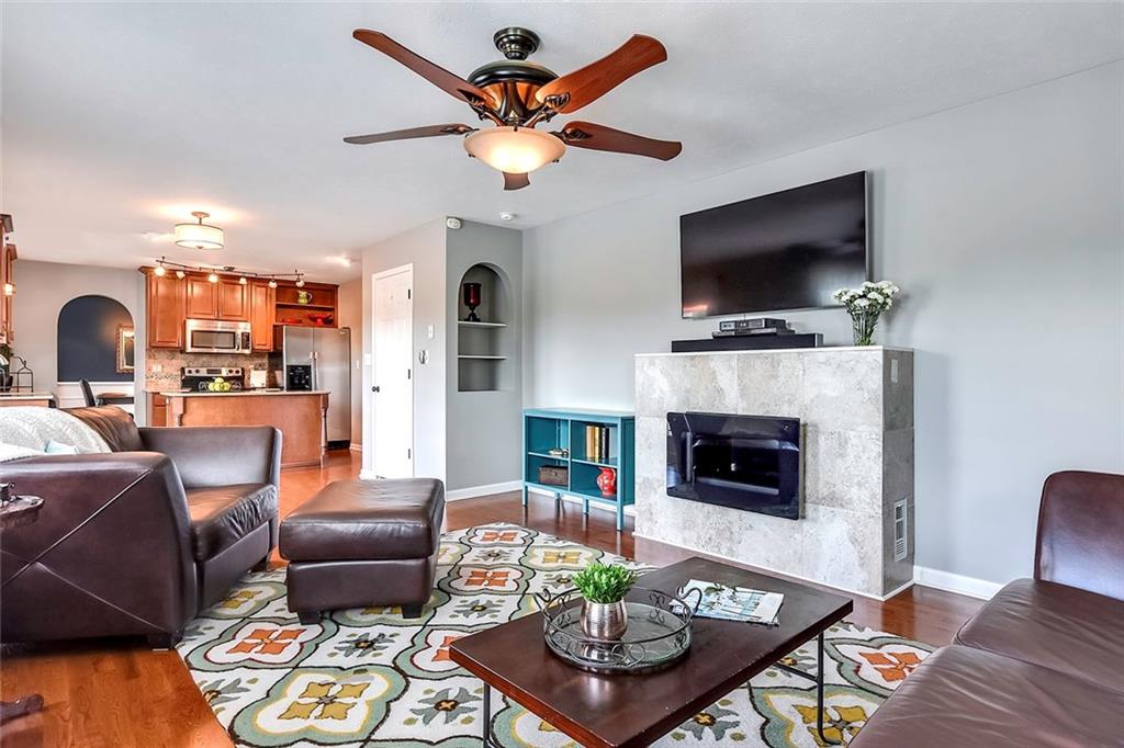 503 Walnut Drive McKees Rocks, PA 15136 - Photo 8 of 25 Neutral wall decor, built in shelving, upgraded lighting, and gas fireplace!!! This family room is the perfect place for entertaining.