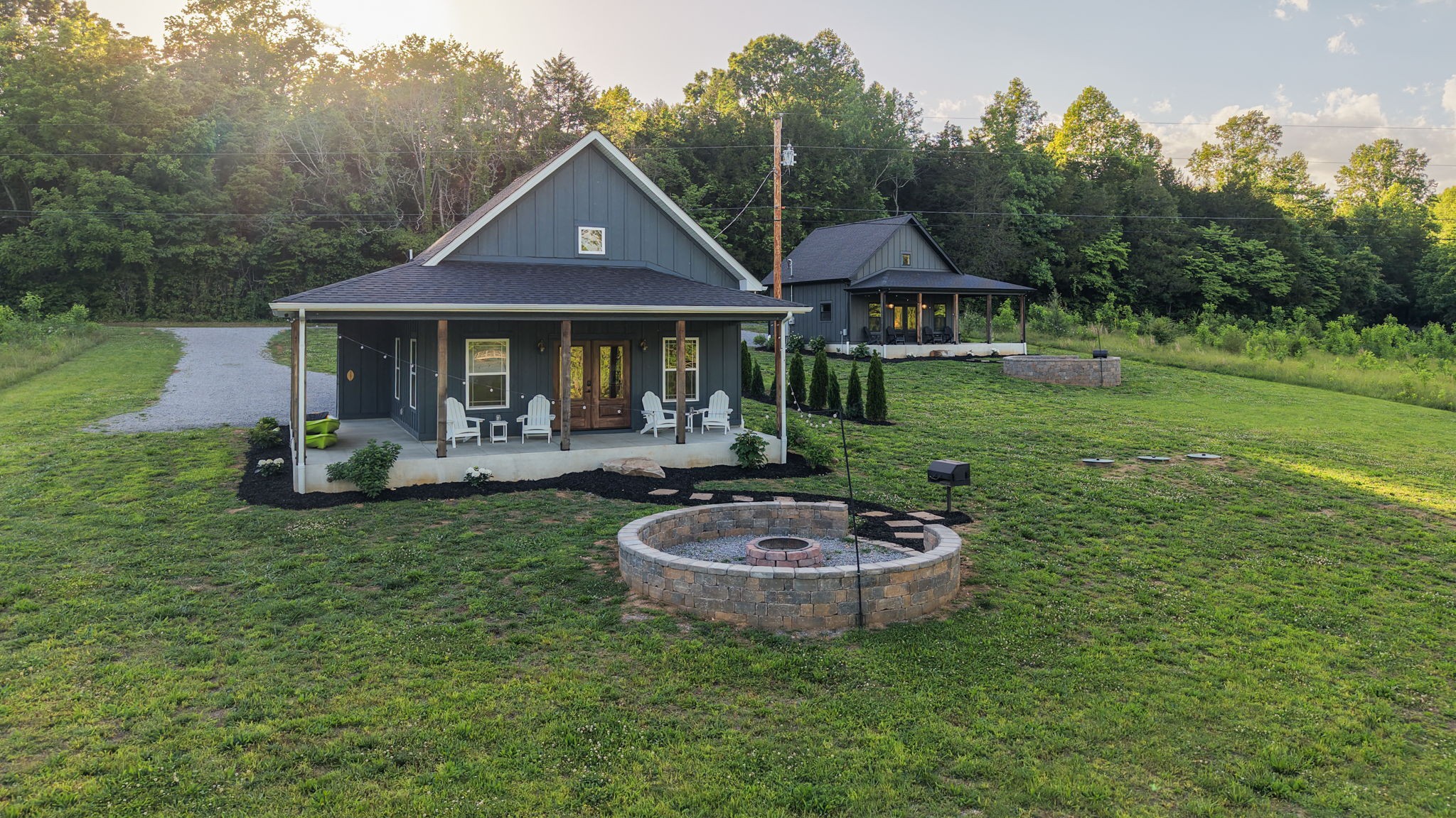 571 Bedford Lake Road Normandy, TN 37360 - Photo 1 of 96 a front view of a house with a garden