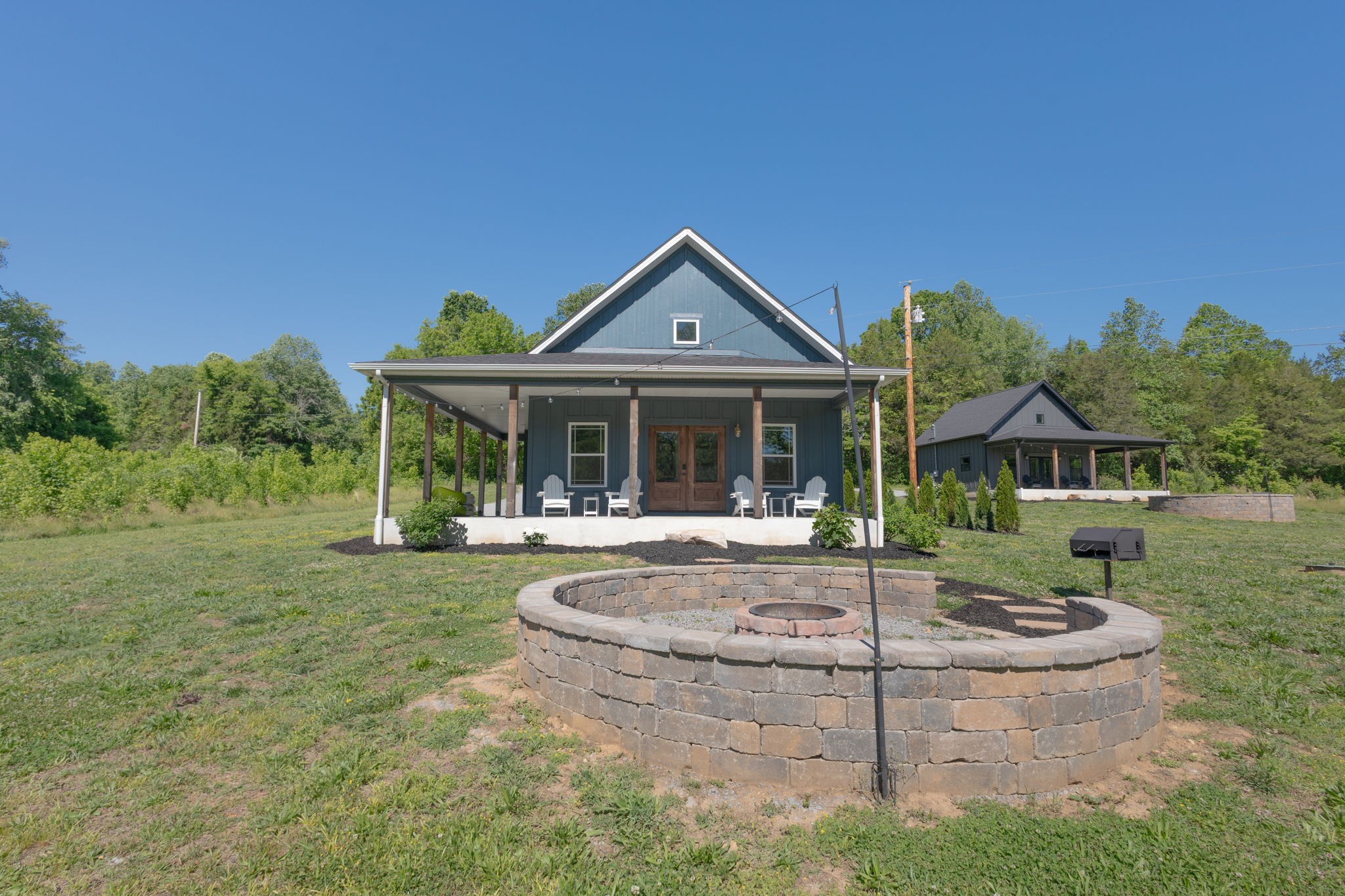 571 Bedford Lake Road Normandy, TN 37360 - Photo 14 of 96 a view of a house with backyard and sitting area