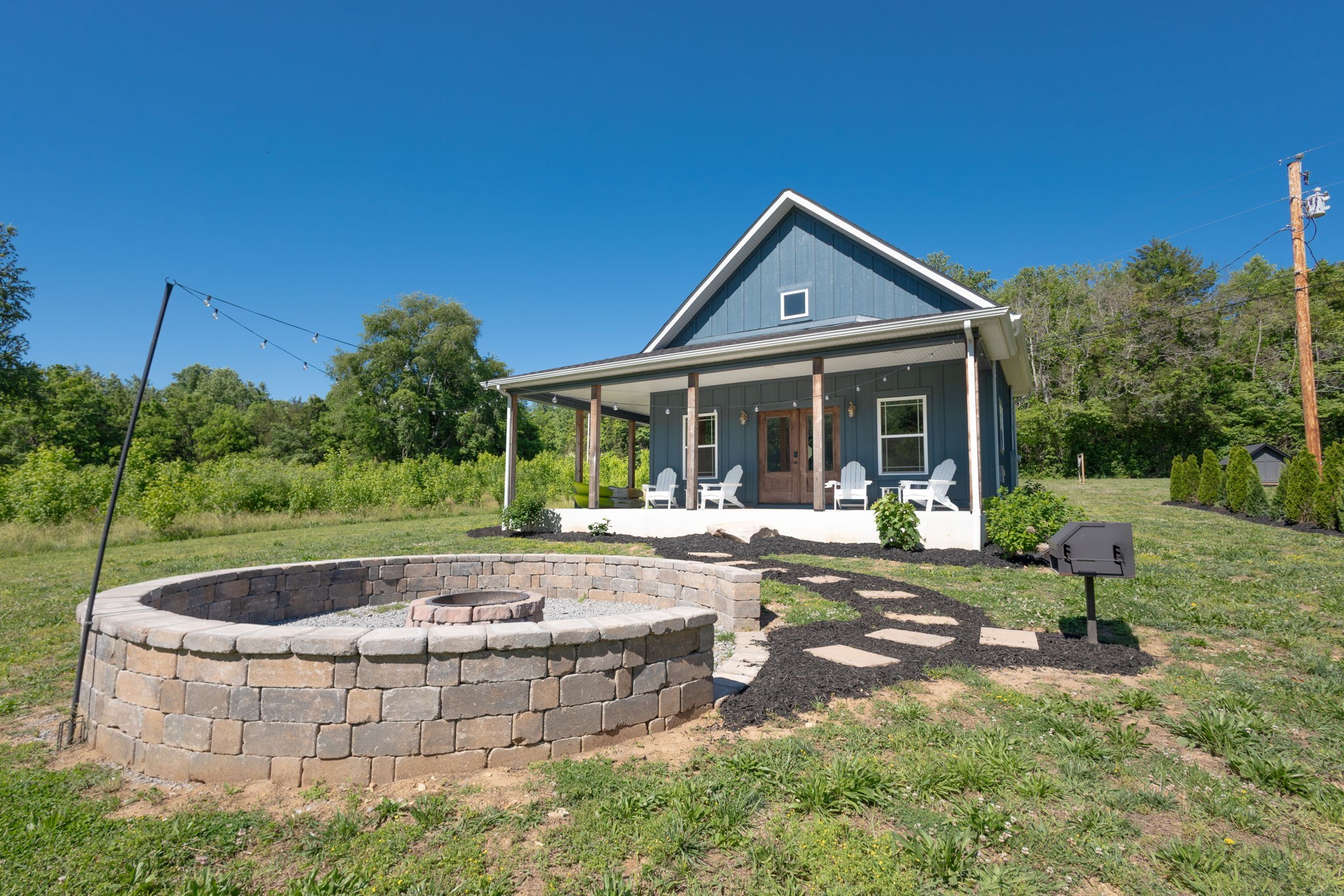 571 Bedford Lake Road Normandy, TN 37360 - Photo 15 of 96 a view of house with backyard outdoor seating and green space