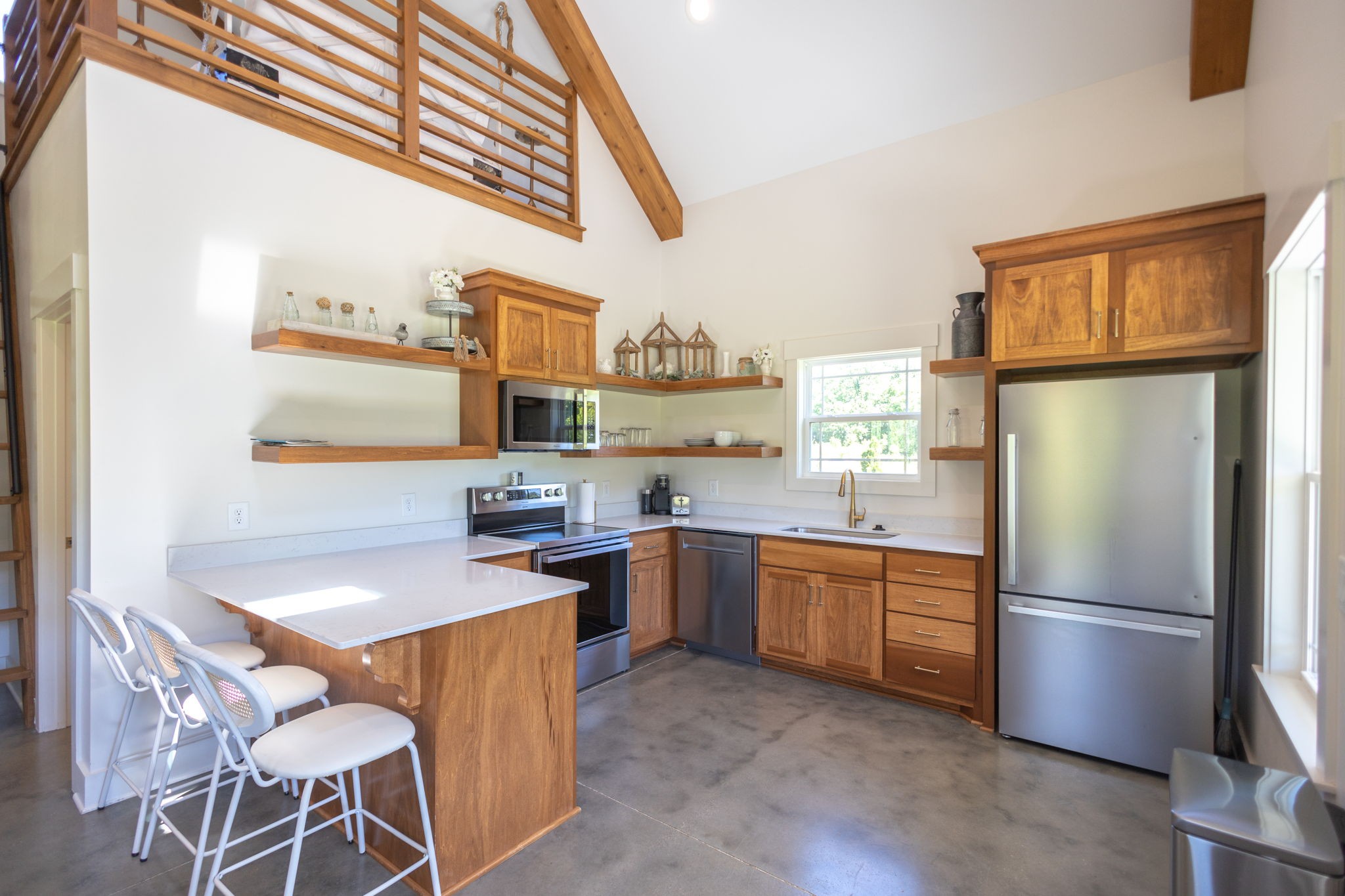571 Bedford Lake Road Normandy, TN 37360 - Photo 20 of 96 a kitchen with stainless steel appliances granite countertop a refrigerator and a stove top oven