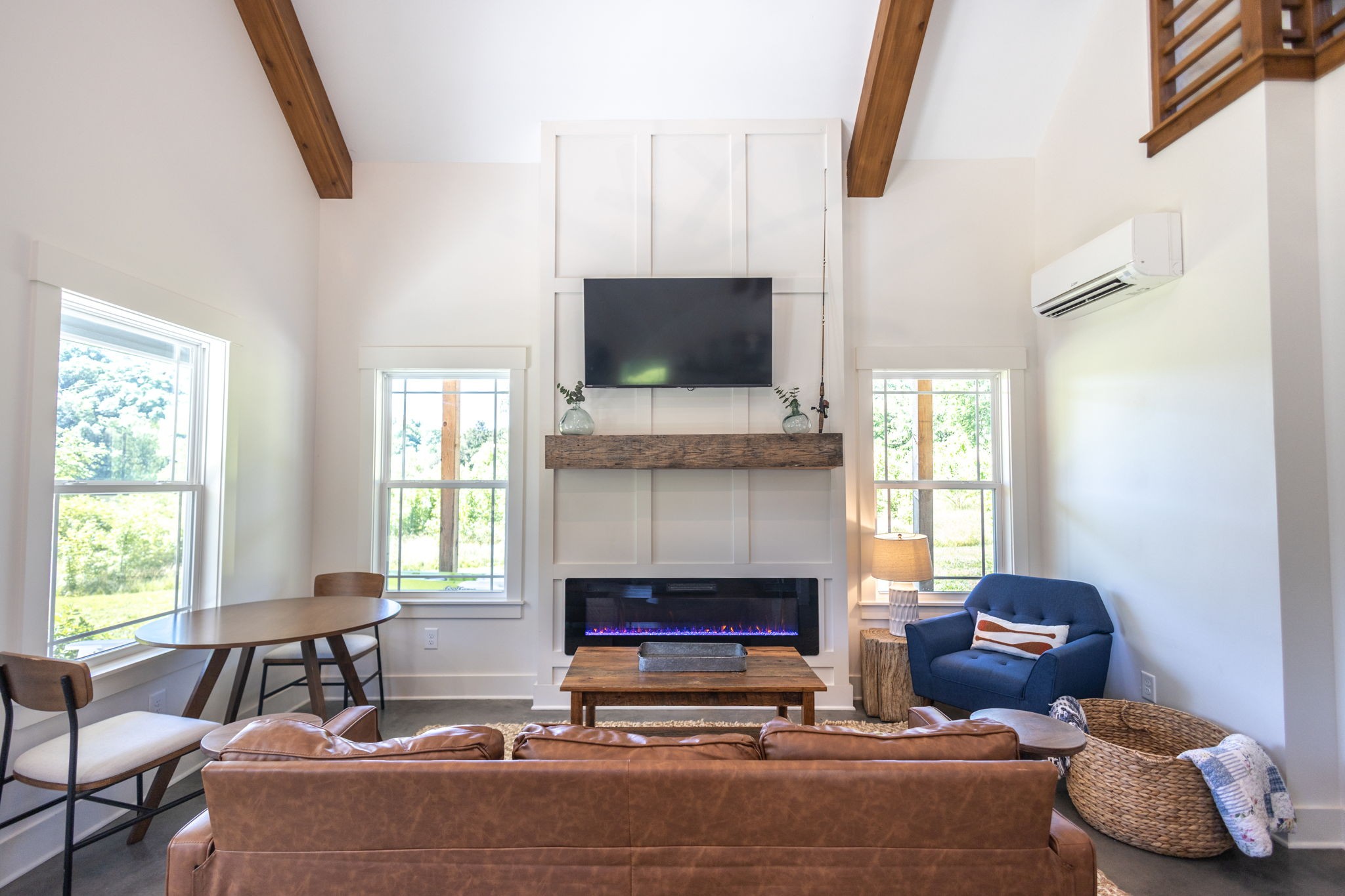 571 Bedford Lake Road Normandy, TN 37360 - Photo 28 of 96 a living room with furniture a flat screen tv and a fireplace