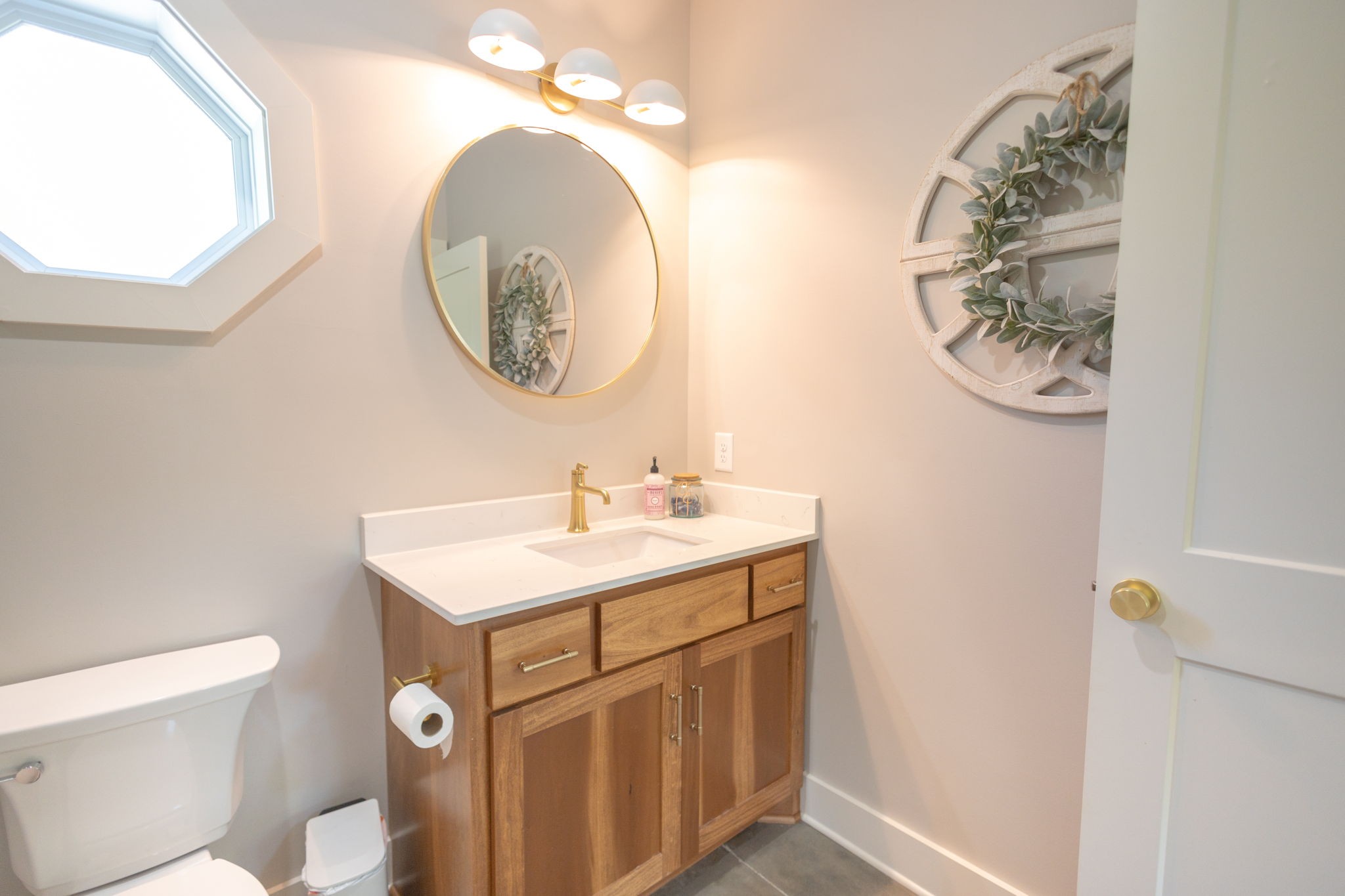 571 Bedford Lake Road Normandy, TN 37360 - Photo 33 of 96 a bathroom with a sink a toilet and a mirror