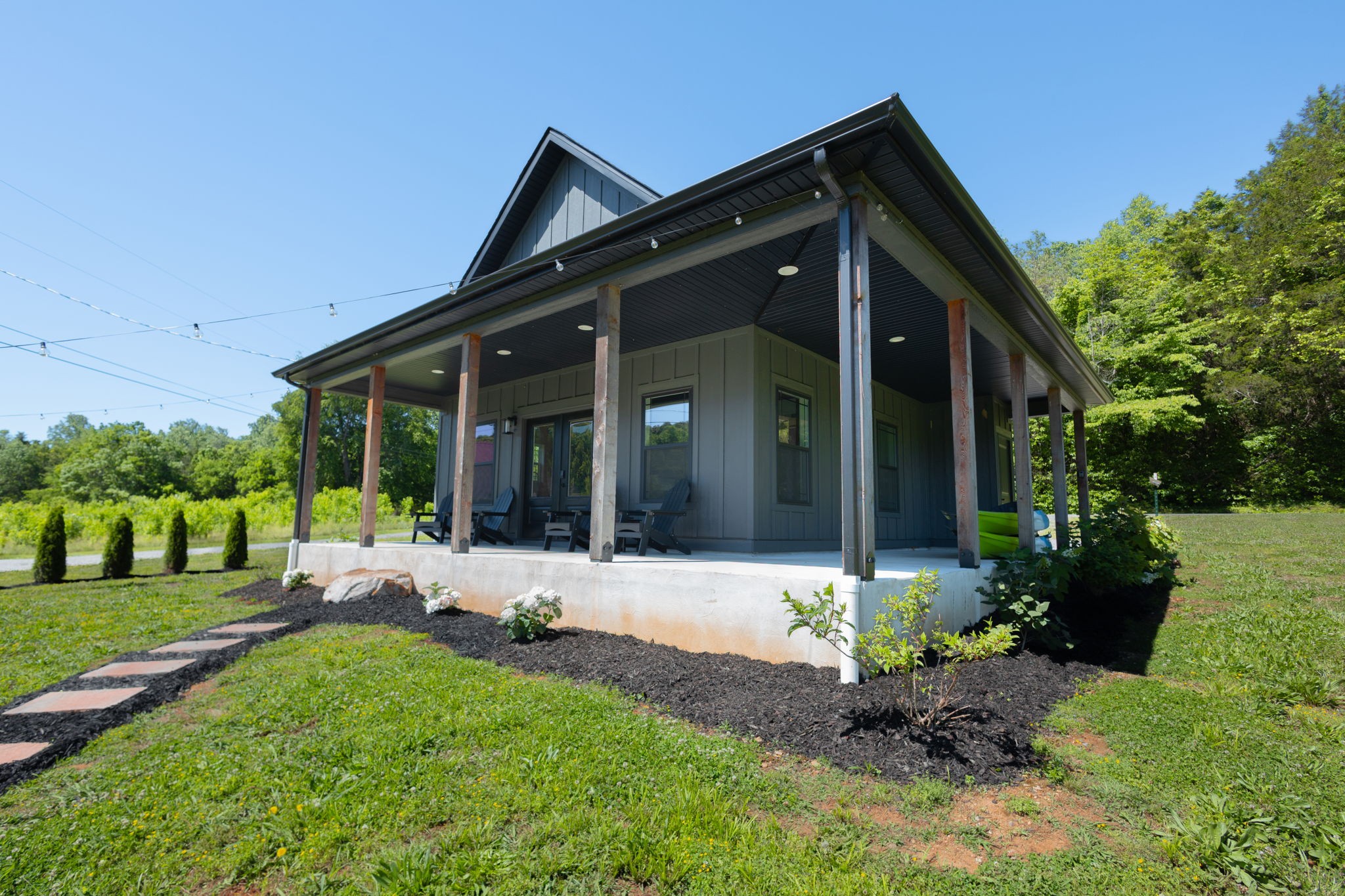 571 Bedford Lake Road Normandy, TN 37360 - Photo 42 of 96 a front view of a house with a yard and porch