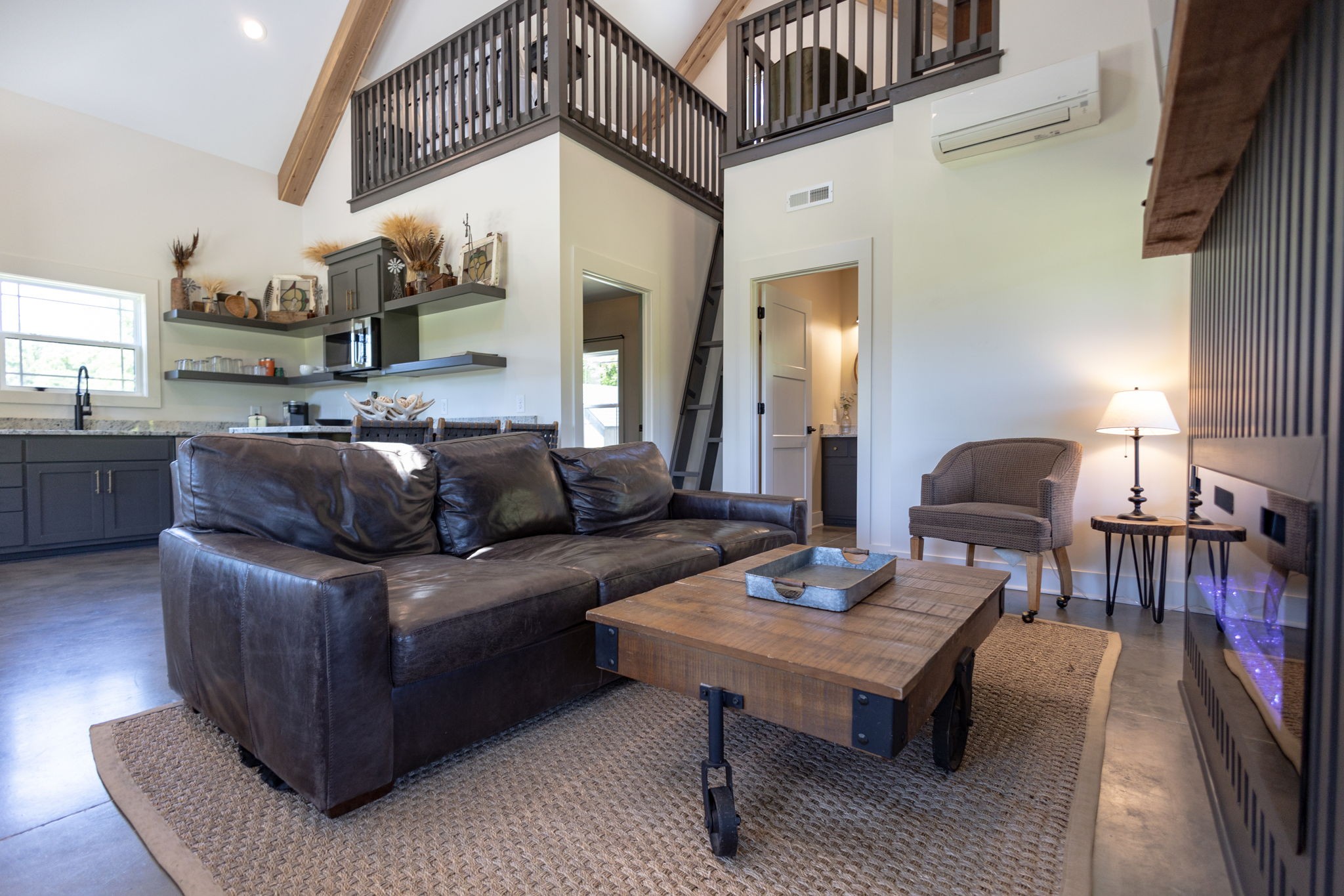 571 Bedford Lake Road Normandy, TN 37360 - Photo 53 of 96 a living room with furniture and a chandelier