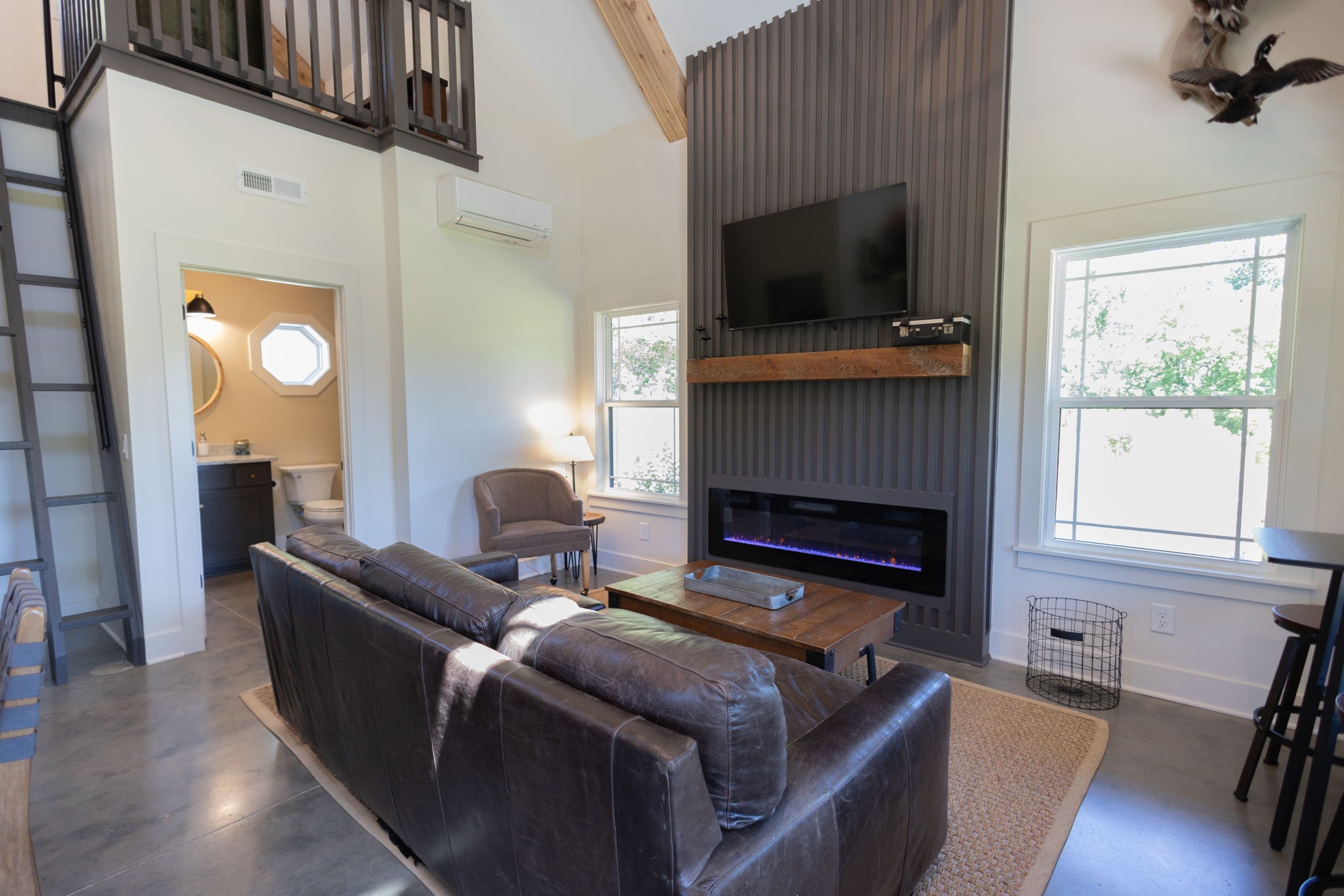 571 Bedford Lake Road Normandy, TN 37360 - Photo 54 of 96 a living room with furniture and a flat screen tv