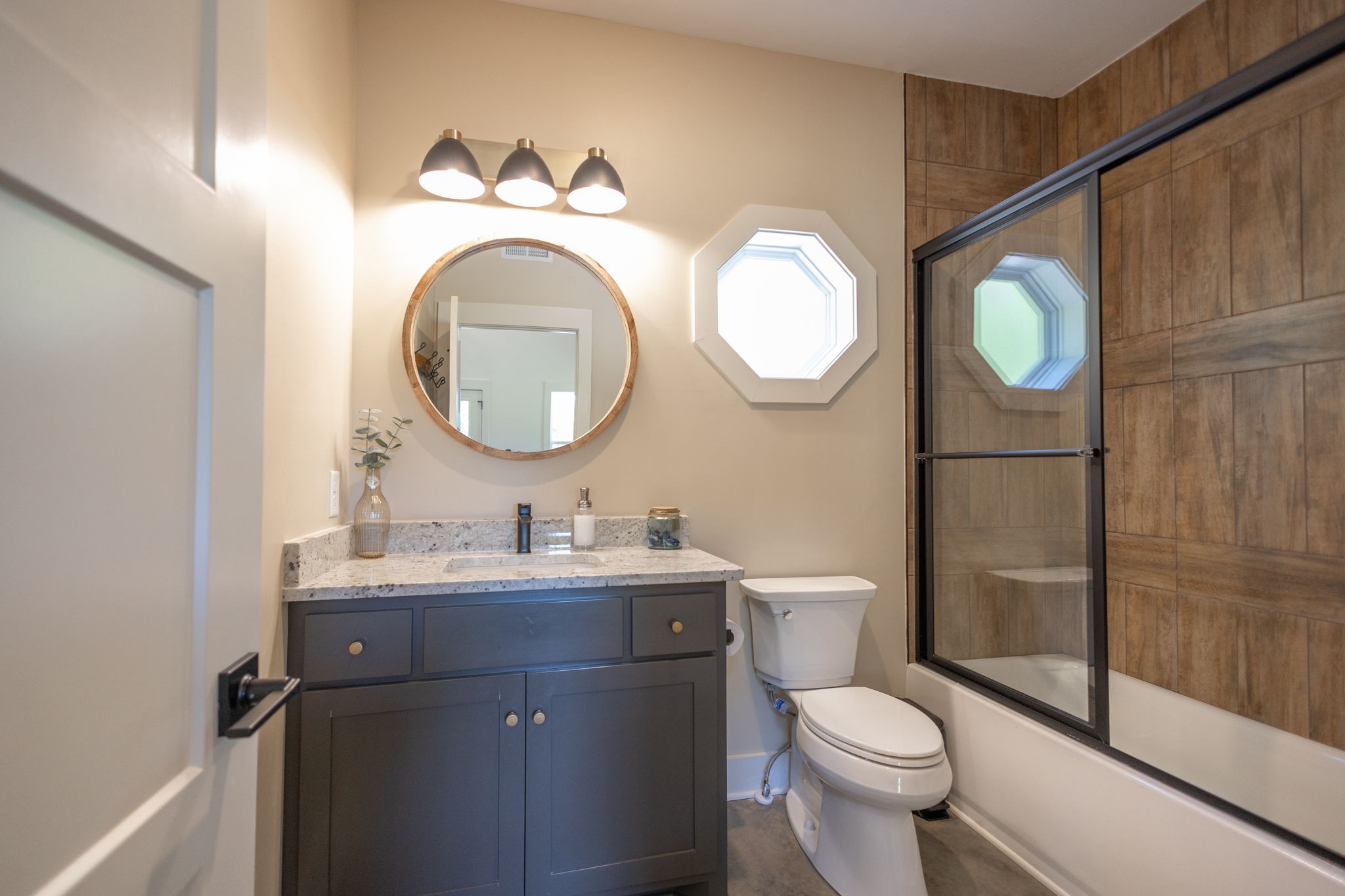571 Bedford Lake Road Normandy, TN 37360 - Photo 57 of 96 a bathroom with a toilet a sink and a mirror