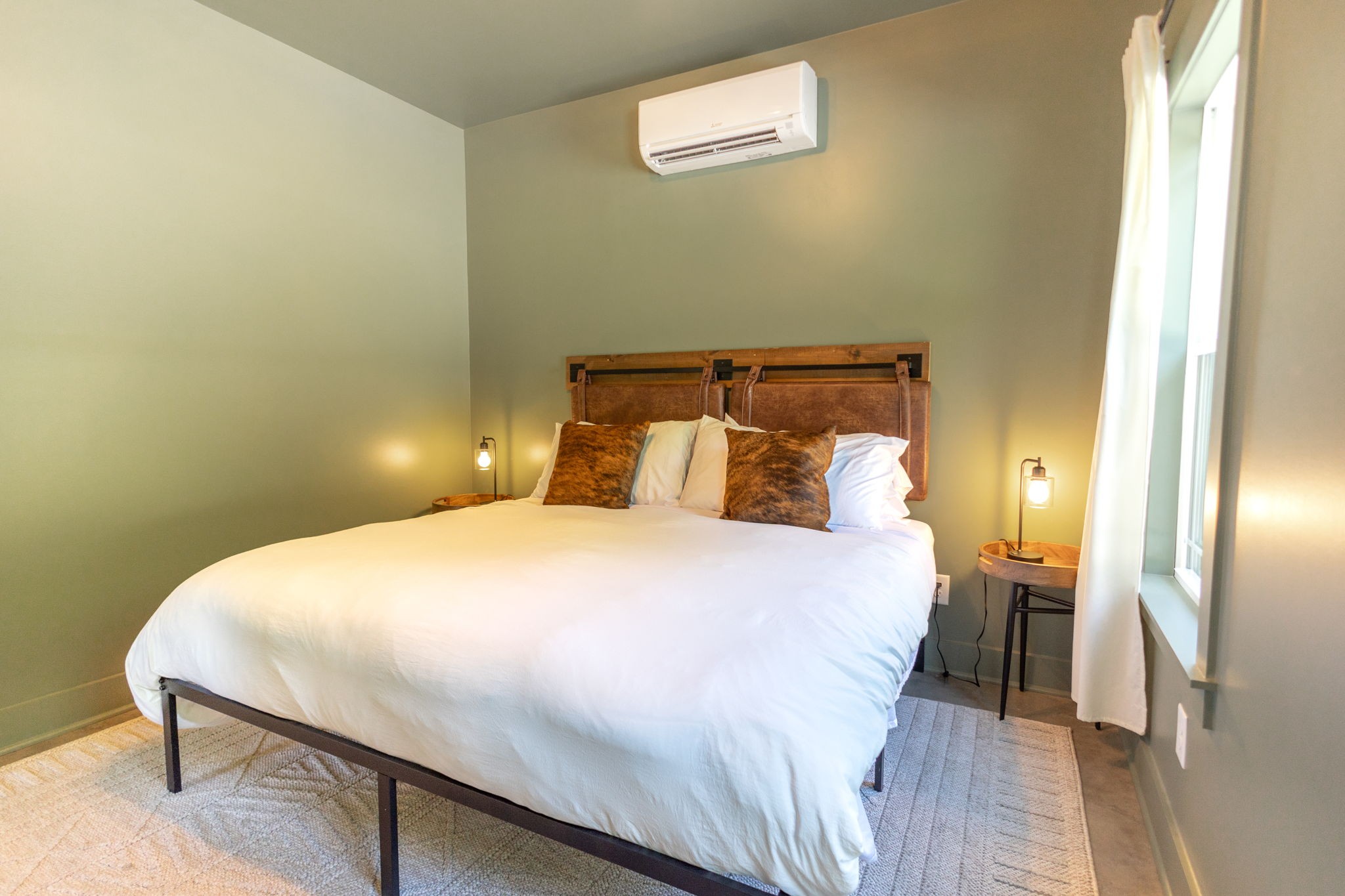 571 Bedford Lake Road Normandy, TN 37360 - Photo 64 of 96 a bedroom with a bed and a painting on the wall