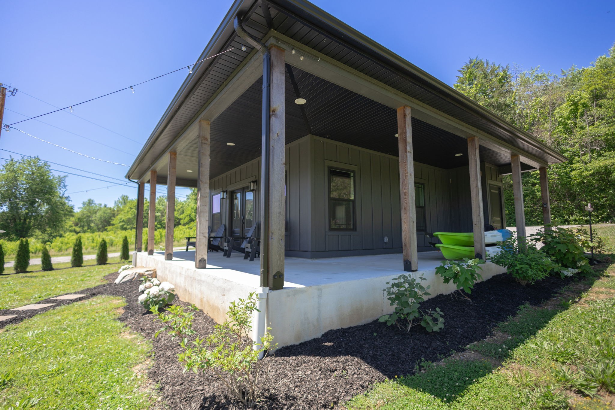 571 Bedford Lake Road Normandy, TN 37360 - Photo 72 of 96 a front view of a house with a yard outdoor seating and garden