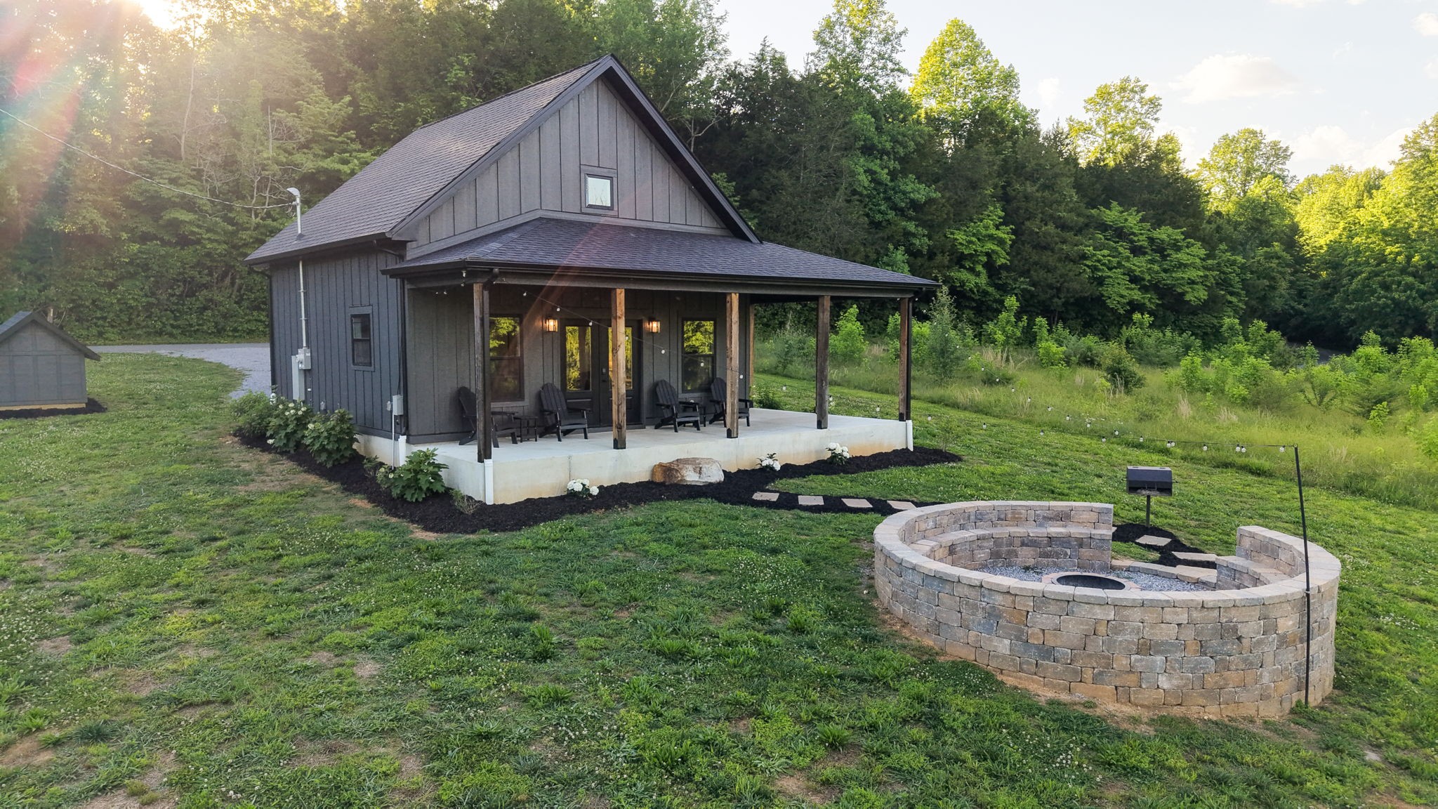 571 Bedford Lake Road Normandy, TN 37360 - Photo 87 of 96 a view of a house with backyard sitting area and garden
