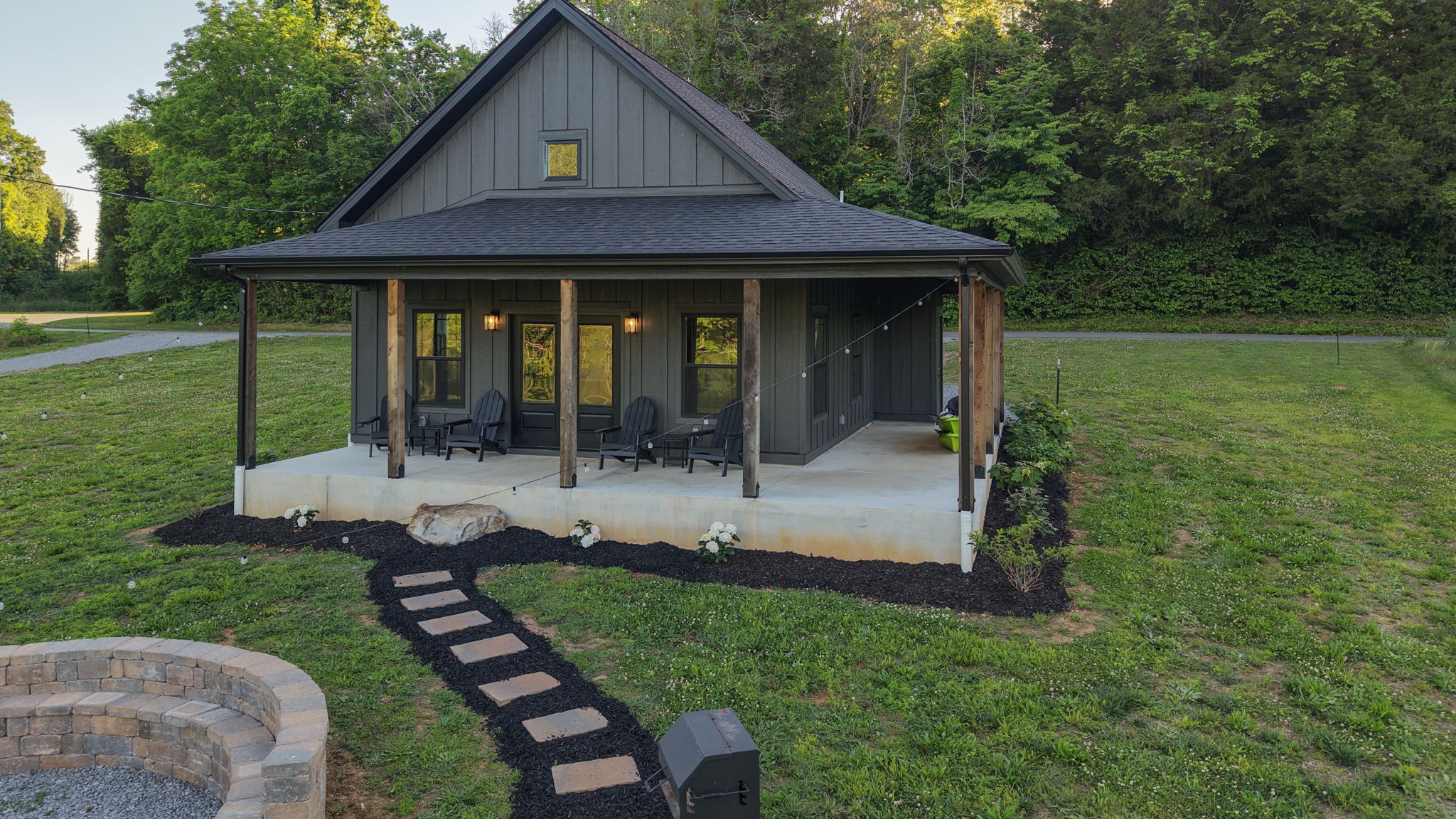 571 Bedford Lake Road Normandy, TN 37360 - Photo 89 of 96 a view of a chair and table in backyard of the house