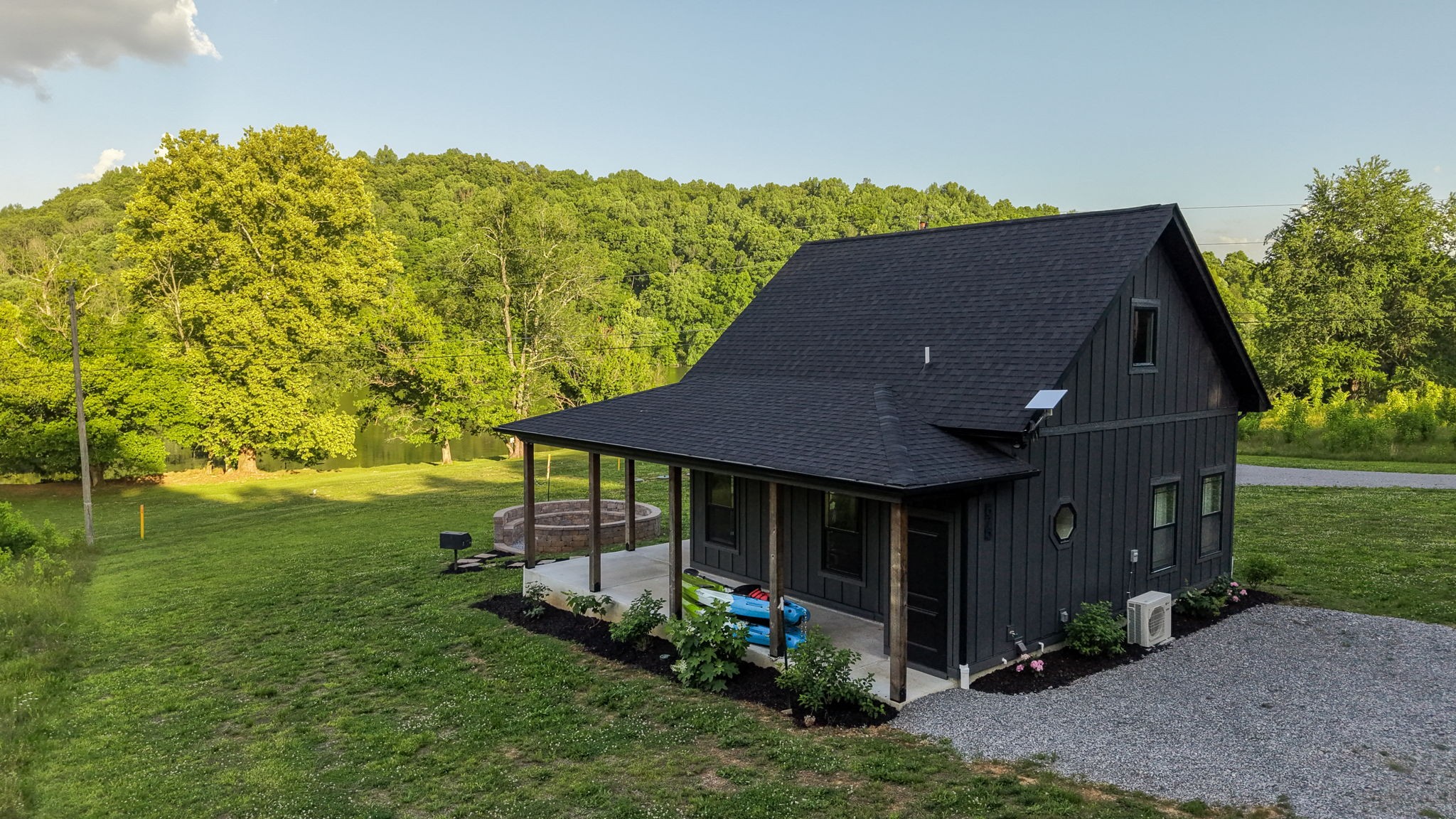 571 Bedford Lake Road Normandy, TN 37360 - Photo 92 of 96 a front view of a house with garden