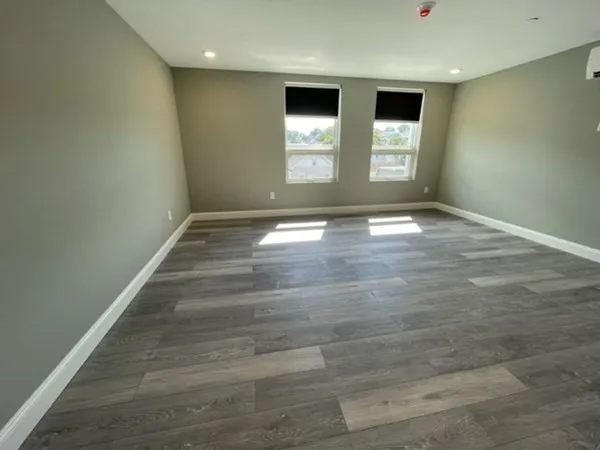 an empty room with windows