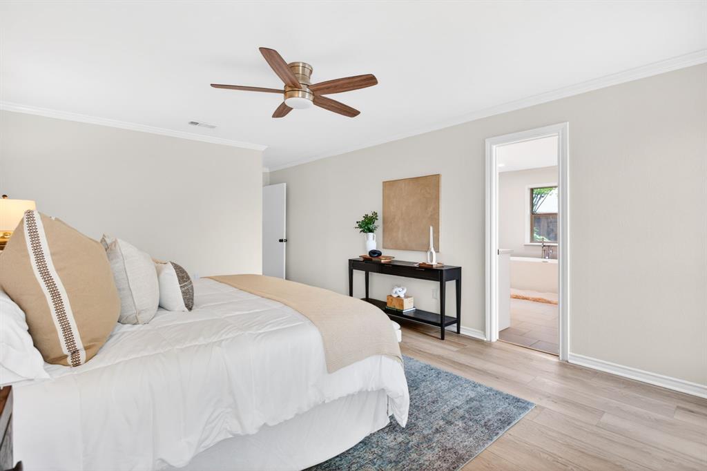 4316 Winding Way Benbrook, TX 76126 - Photo 21 of 40 a bedroom with a bed and a dresser