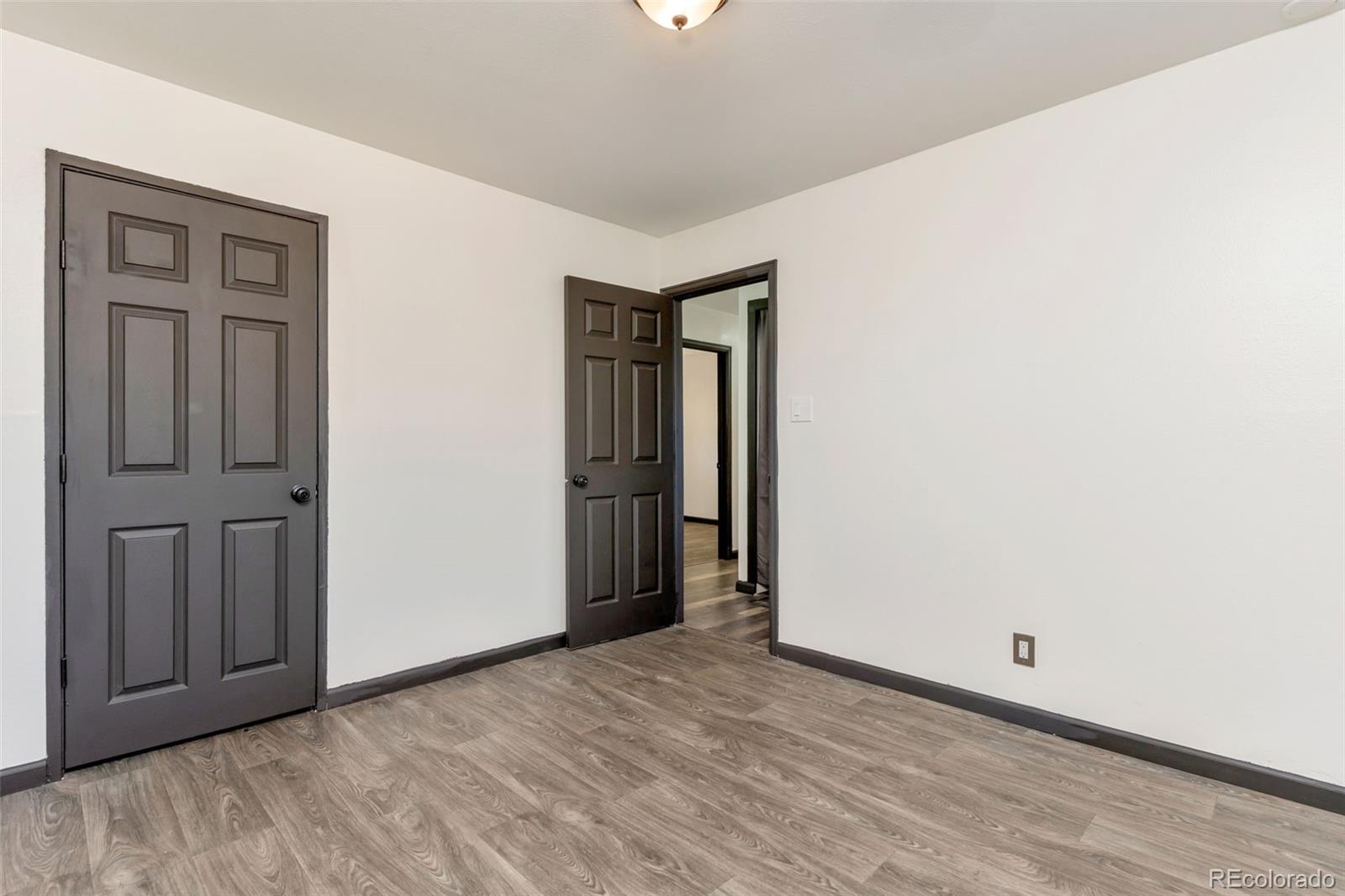 1781 Rowena Street Thornton, CO 80229 - Photo 11 of 21 a view of an empty room with closet and closet area