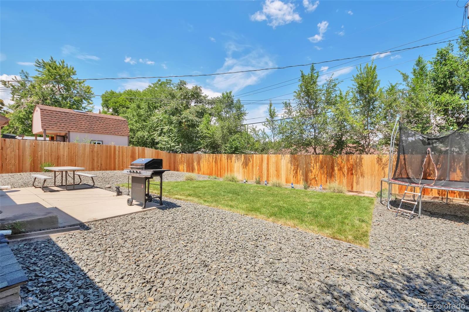 1781 Rowena Street Thornton, CO 80229 - Photo 16 of 21 swimming pool view with a garden space