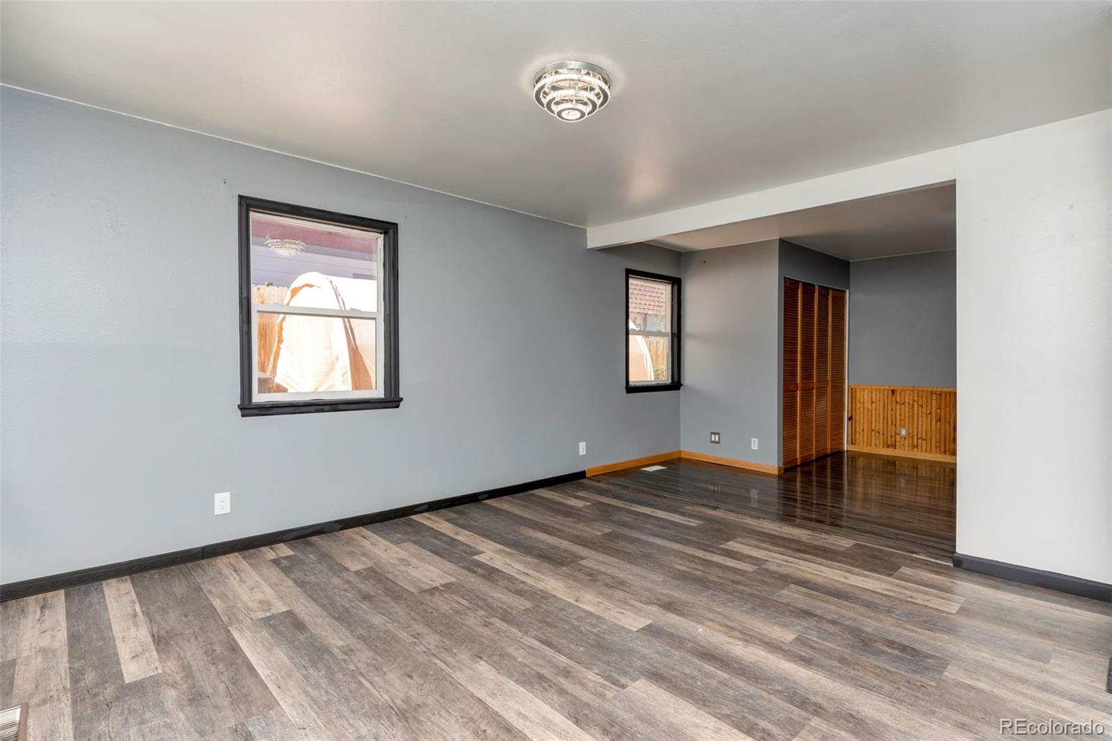 1781 Rowena Street Thornton, CO 80229 - Photo 5 of 21 a view of an empty room with a window